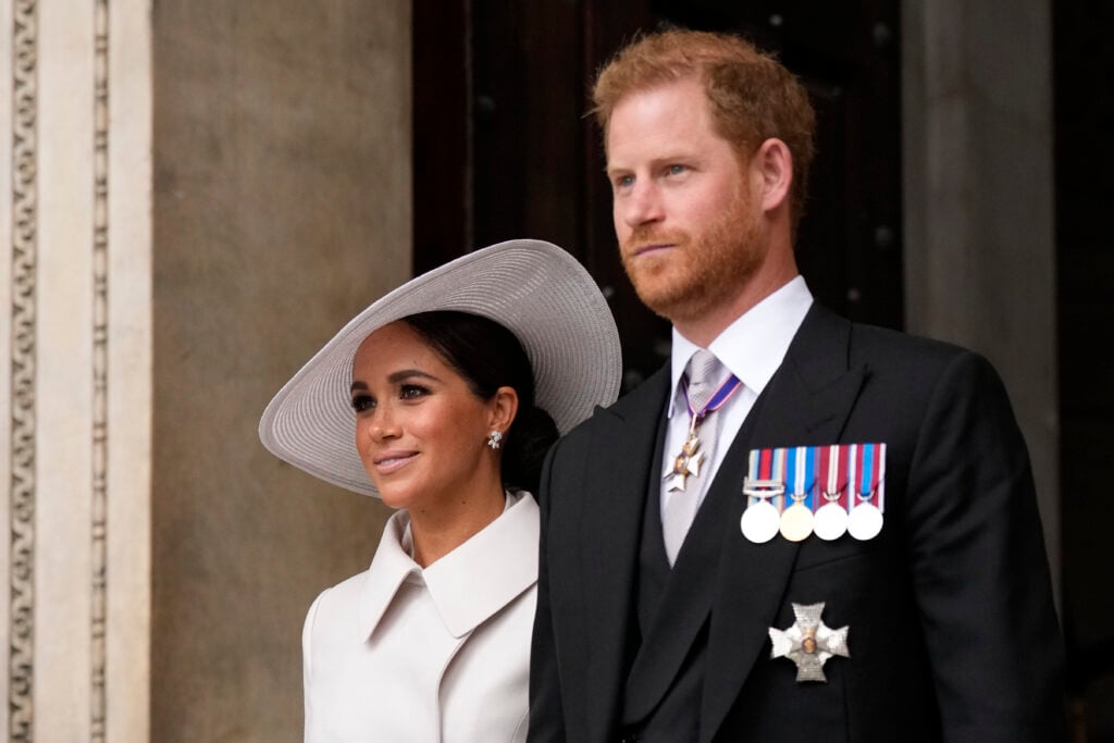 Prince Harry and Meghan Markle, Duke and Duchess of Sussex leave after a service of thanksgiving for the reign of Queen Elizabeth II at St Paul's Cathedral in London, Friday, June 3, 2022 on the second of four days of celebrations to mark the Platinum Jubilee. 