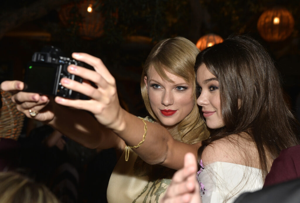 Singer Taylor Swift and actress Hailee Steinfeld attend the premiere of Relativity Media's Romeo And Juliet after party at Soho House on September 24, 2013 in Hollywood, California.  