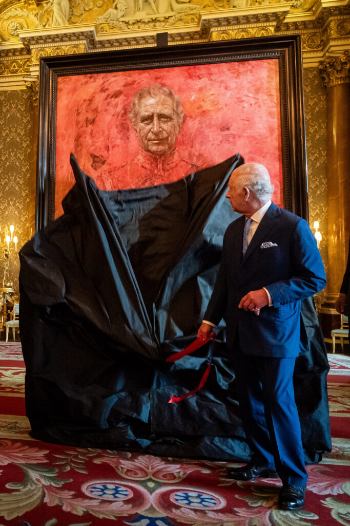 King Charles III unveils his portrait by artist Jonathan Yeo in the blue drawing room at Buckingham Palace on May 14, 2024 in London, England. 