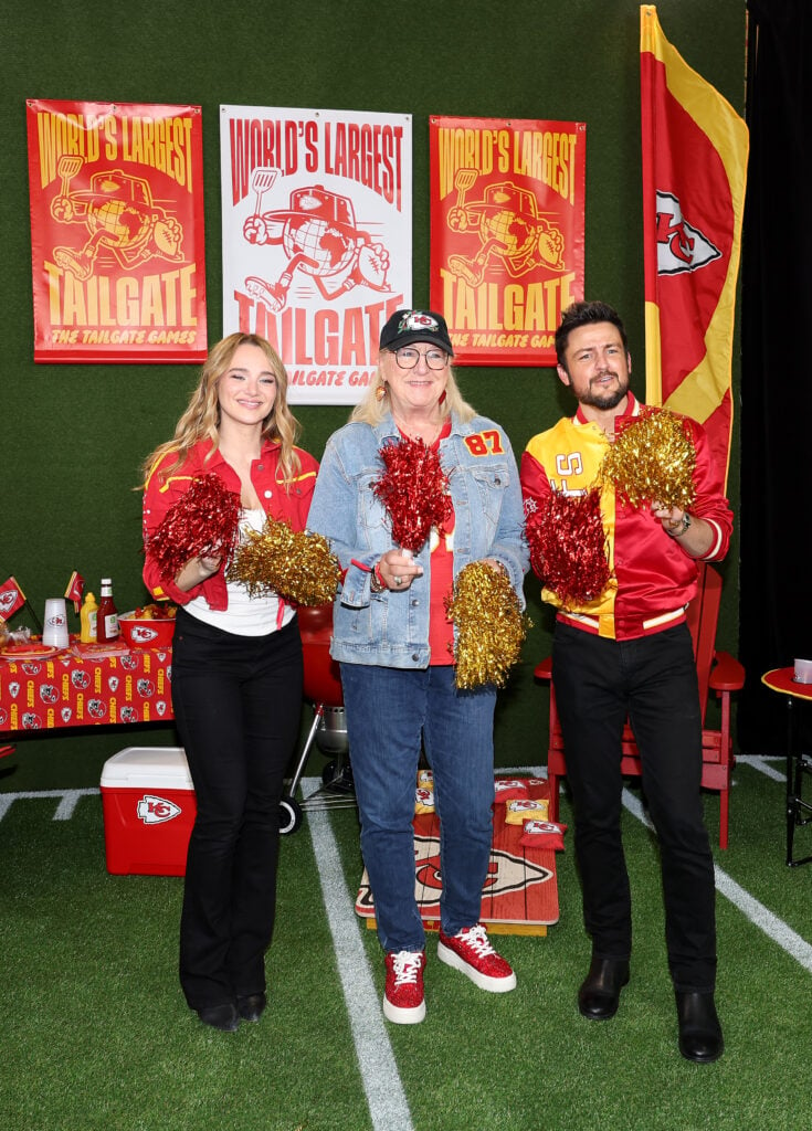 Hunter King, Donna Kelce and Tyler Hynes attend the red carpet at the World's Largest Tailgate ahead of the Baltimore Ravens v Kansas City Chiefs game at GEHA Field at Arrowhead Stadium on September 05, 2024 in Kansas City, Missouri. 